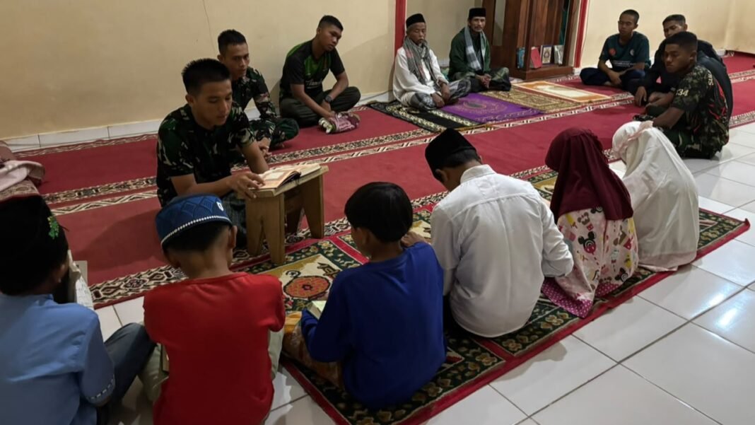 Usai Shalat Magrib Berjamaah, Satgas TMMD ke 130 Kodim 0605/Subang Dampingi Anak Anak Mengaji, Wujudkan Kemanunggalan TNI dengan Rakyat Usai Shalat Magrib Berjamaah, Satgas TMMD ke 130 Kodim 0605/Subang Dampingi Anak Anak Mengaji, Wujudkan Kemanunggalan TNI dengan Rakyat